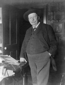 Joel Chandler Harris, three-quarter-length portrait, standing, facing slightly left, c1890 and 1910. Creator: Frances Benjamin Johnston