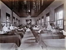 Johannesburg Hospital, South Africa: hospital ward with male patients, many with bandaged...c1905. Creator: Unknown