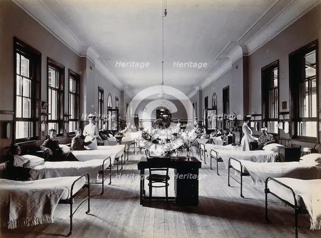 Johannesburg Hospital, South Africa: hospital ward with nurses and male patients, c1905. Creator: Unknown.