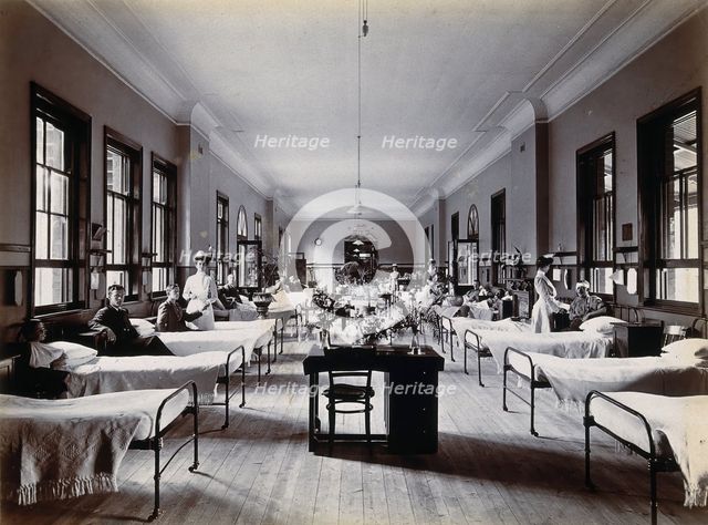 Johannesburg Hospital, South Africa: hospital ward with nurses and male patients, c1905. Creator: Unknown.