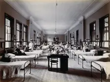 Johannesburg Hospital, South Africa: hospital ward with nurses and male patients, c1905. Creator: Unknown