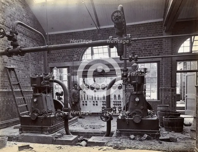 Johannesburg Hospital, South Africa: member of staff, possibly in the boiler room, c1905. Creator: Unknown.