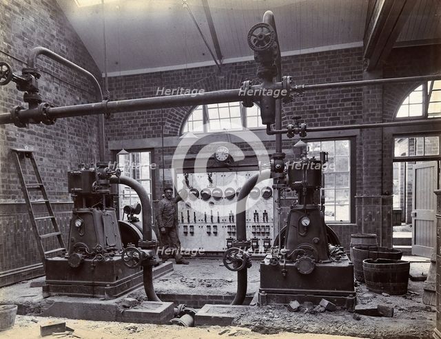 Johannesburg Hospital, South Africa: member of staff, possibly in the boiler room, c1905. Creator: Unknown.