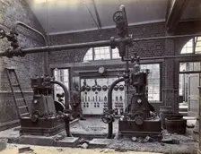 Johannesburg Hospital, South Africa: member of staff, possibly in the boiler room, c1905. Creator: Unknown