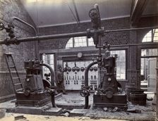 Johannesburg Hospital, South Africa: member of staff, possibly in the boiler room, c1905. Creator: Unknown