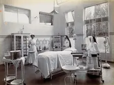 Johannesburg Hospital, South Africa: operating theatre with nun and nurse, c1905. Creator: Unknown