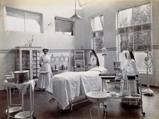Johannesburg Hospital, South Africa: operating theatre with nun and nurse, c1905. Creator: Unknown