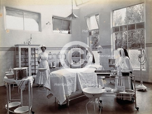 Johannesburg Hospital, South Africa: operating theatre with nun and nurse, c1905. Creator: Unknown.