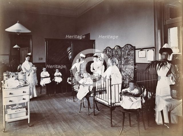 Johannesburg Hospital, South Africa: small hospital ward with nurses and children, c1905. Creator: Unknown.