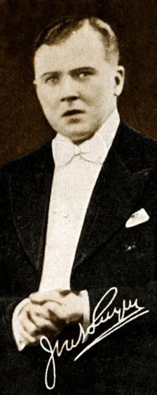 John Wesley Vivian Jack Payne (1899-1969), British dance music bandleader, 1935