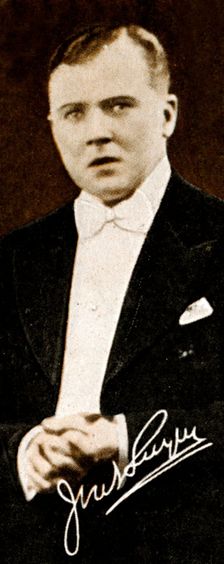 John Wesley Vivian Jack Payne (1899-1969), British dance music bandleader, 1935