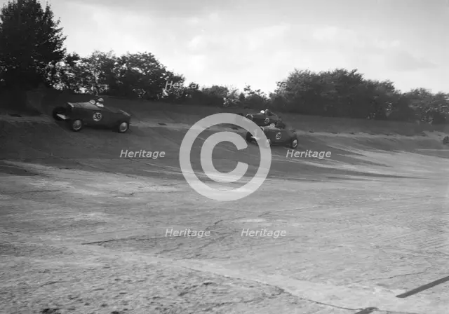 John Cobb and Tim Rose-Richards' Talbot 105s, BRDC 500 Mile Race, Byfleet Banking, Brooklands, 1931. Artist: Bill Brunell.
