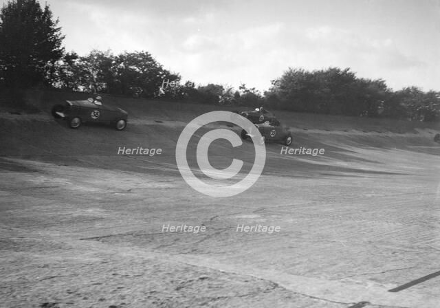 John Cobb and Tim Rose-Richards' Talbot 105s, BRDC 500 Mile Race, Byfleet Banking, Brooklands, 1931. Artist: Bill Brunell.