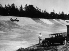 John Cobb's Napier Railton on the banking, Brooklands, Surrey, c1933-c1935