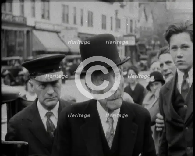 John D Rockefeller in a Suit and Hat Getting Out of a Car, 1932. Creator: British Pathe Ltd.