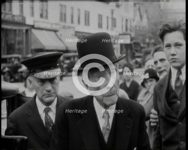 John D Rockefeller in a Suit and Hat Getting Out of a Car, 1932. Creator: British Pathe Ltd.