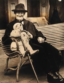 John Daubeny, a centenarian, holding a 1 year old boy, c1922. Creator: Unknown