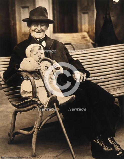 John Daubeny, a centenarian, holding a 1 year old boy, c1922. Creator: Unknown.