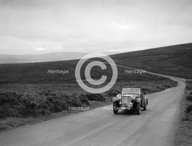 John Donald Barnes' Autosports team Singer B37 at the MCC Torquay Rally, July 1937. Artist: Bill Brunell.