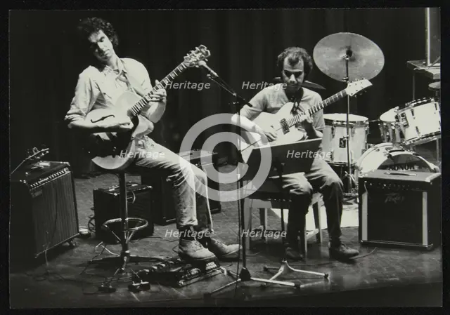 John Etheridge and Gary Boyle playing at Campus West Welwyn Garden City, Hertfordshire, 1984. Creator: Denis Williams.