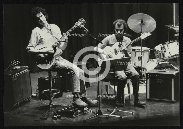 John Etheridge and Gary Boyle playing at Campus West Welwyn Garden City, Hertfordshire, 1984. Artist: Denis Williams