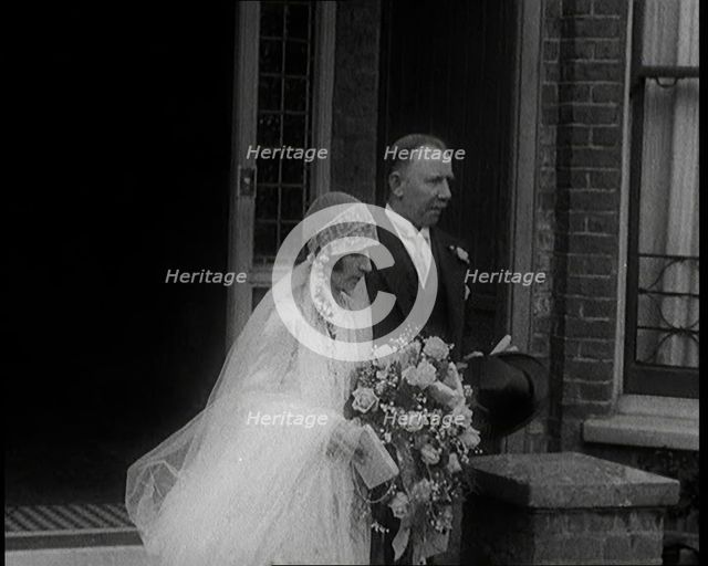 John Henry Thomas and His Daughter Emerging from a Building, 1924. Creator: British Pathe Ltd.