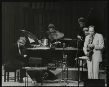 John Horler, Tony Kinsey, Alec Dankworth and John Dankworth performing in London, 1985. Creator: Denis Williams