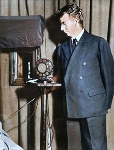 John Logie Baird watching the first play to be televised, 14 July 1930, (1935). Creator: Unknown