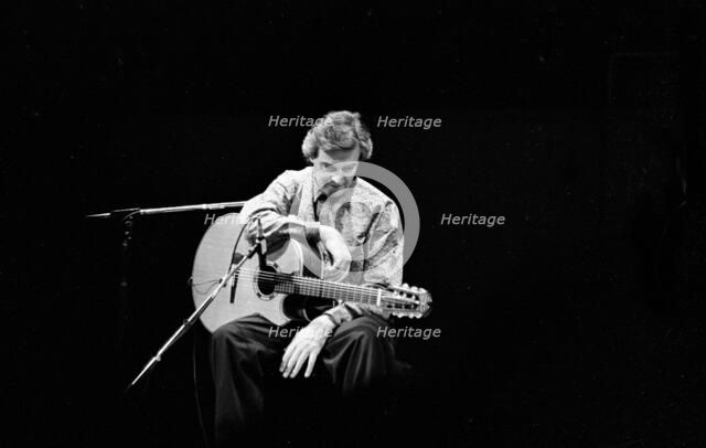John McLaughlin, Fairfield Halls, Croydon, London, 1987. Creator: Brian O'Connor.