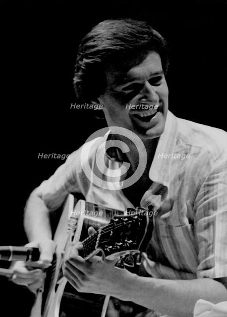 John McLaughlin,  jazz guitarist, bandleader and composer, London , 1976. Artist: Brian O'Connor.