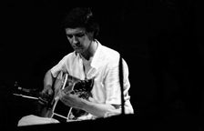 John McLaughlin, London, 1975. Creator: Brian O'Connor