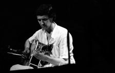John McLaughlin, London, 1975. Creator: Brian O'Connor