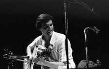 John McLaughlin, London, 1975. Creator: Brian O'Connor