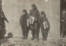 John Pento, 14 years old, Daniel and Angelo Pento, 7 years old, selling newspapers..., 3348. Creator: Lewis Wickes Hine