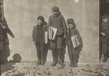 John Pento, 14 years old, Daniel and Angelo Pento, 7 years old, selling newspapers..., 3348. Creator: Lewis Wickes Hine
