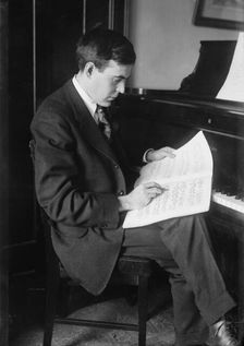 John Powell at piano, between c1915 and c1920. Creator: Bain News Service