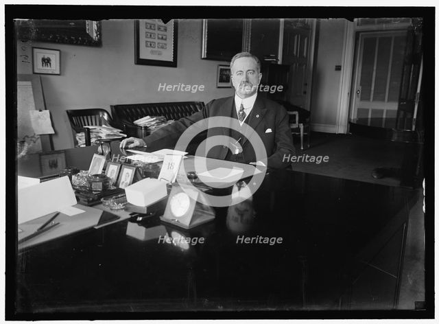 John Skelton Williams at desk, between 1913 and 1918. Creator: Harris & Ewing.