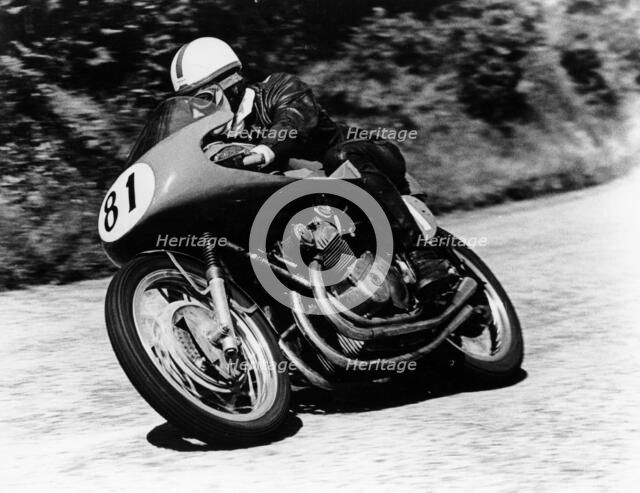 John Surtees on an MV Agusta, Isle of Man Senior TT, 1956. Artist: Unknown