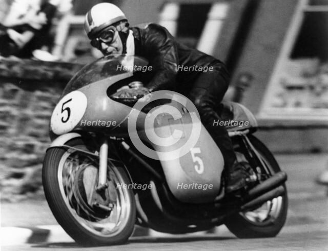 John Surtees winning the Isle of Man Junior TT, on an MV Agusta, 1959. Artist: Unknown