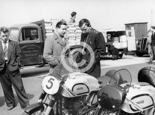 John Surtees with Norton motorcycles, 1954. Artist: Unknown