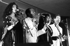 Jon Hendricks with three unidentified singers, c1998. Creator: Brian Foskett