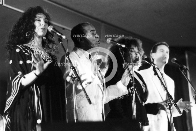 Jon Hendricks with three unidentified singers, c1998. Creator: Brian Foskett.