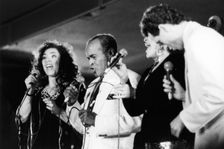 Jon Hendricks and three unidentified singers, c1998. Creator: Brian Foskett