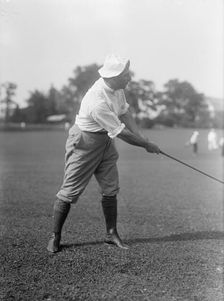 Joseph Edward Davies, Chairman, Federal Trade Commission. Playing Golf, 1917. Creator: Harris & Ewing