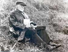 Joseph Rowntree eating lunch on grass at Scarborough, North Yorkshire, 1918