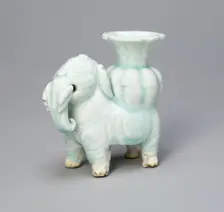 Joss-Stick Holder in the Form of an Elephant Holding a Lobed Vase, Yuan dynasty (1271-1368). Creator: Unknown