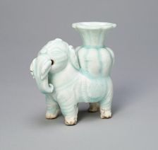 Joss-Stick Holder in the Form of an Elephant Holding a Lobed Vase, Yuan dynasty (1271-1368). Creator: Unknown