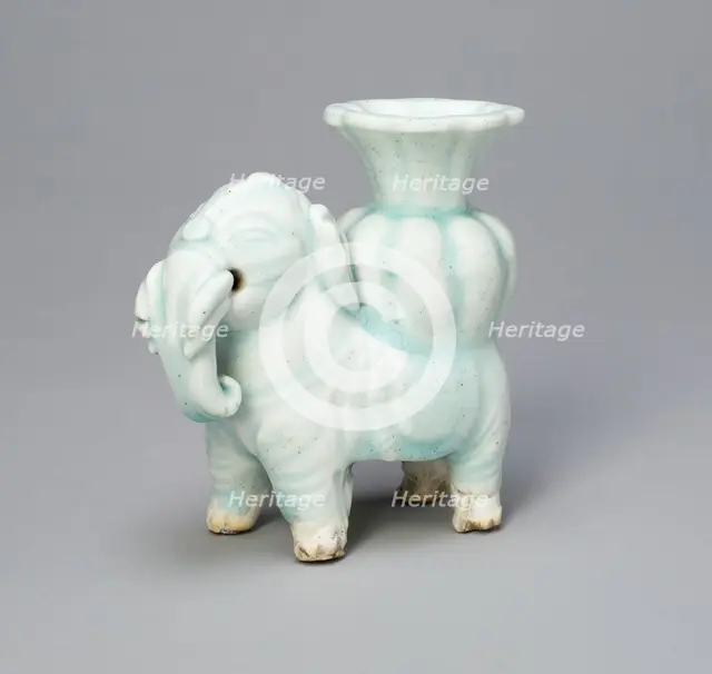 Joss-Stick Holder in the Form of an Elephant Holding a Lobed Vase, Yuan dynasty (1271-1368). Creator: Unknown.