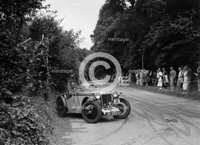 JA Bastock's MG PA, winner of a silver award at the MCC Torquay Rally, July 1937. Artist: Bill Brunell.