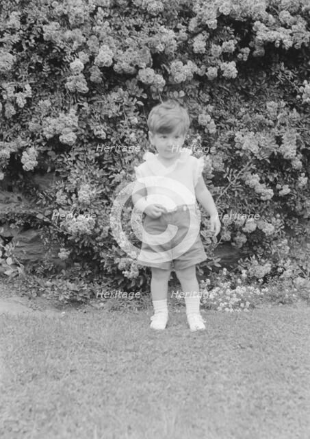 Javits, Benjamin, child of, standing outdoors, 1933 July. Creator: Arnold Genthe.